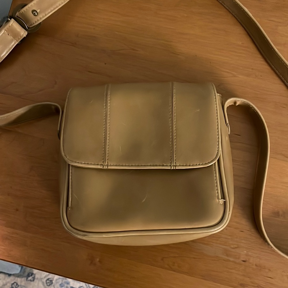 Liz Claiborne tan crossbody purse, tan, snap closure opens to 3 compartments.